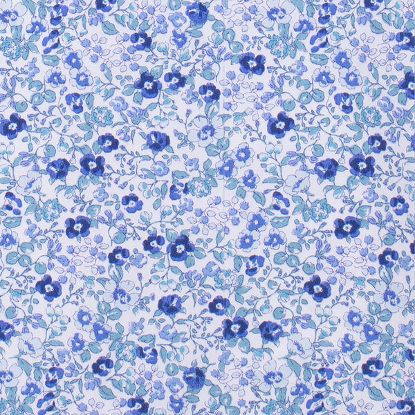 Blusa flor azul, cuello volante