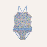 Traje de baño volantes flores fondo azul