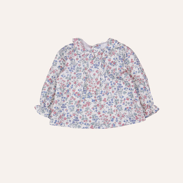Blusa flores fondo crudo