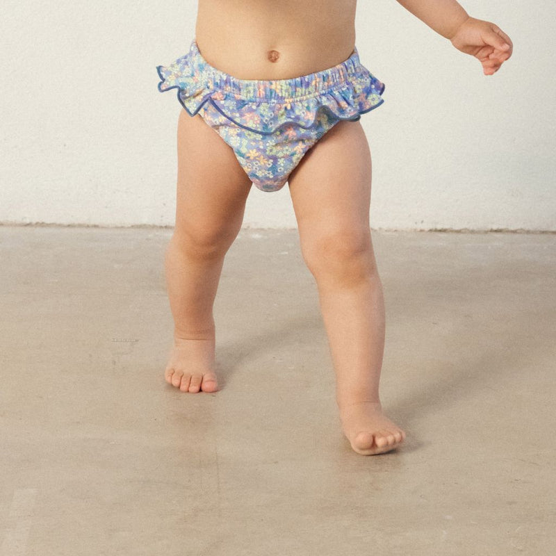 Culetin pañal flores fondo azul