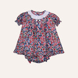 Jesusito arándanos y flores rojas