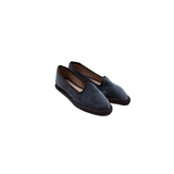 Slipper cinta con horma estilizada