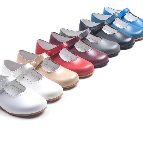 Mercedita piel botón