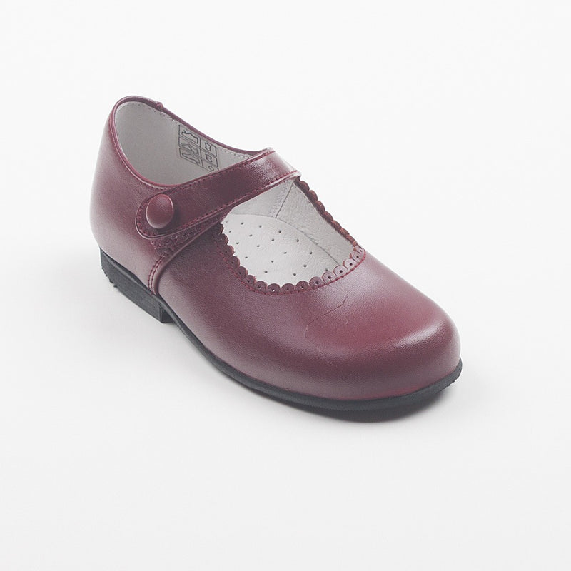 Mercedita piel botón