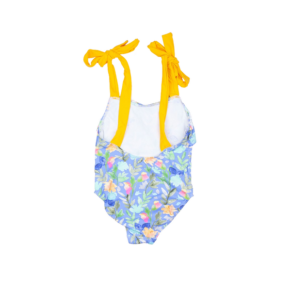 Traje de baño flores sobre fondo azul