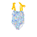 Traje de baño flores sobre fondo azul